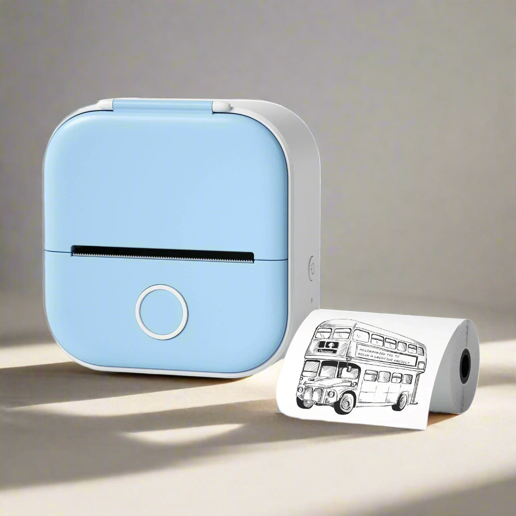 Small blue printer with a printed roll of paper featuring a bus design on a white background